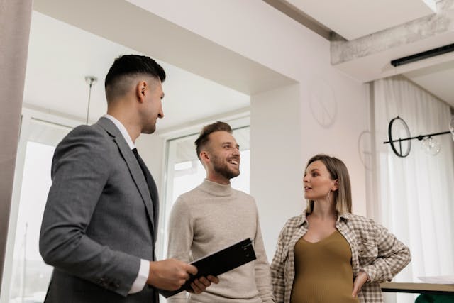 A agent talking to client couple